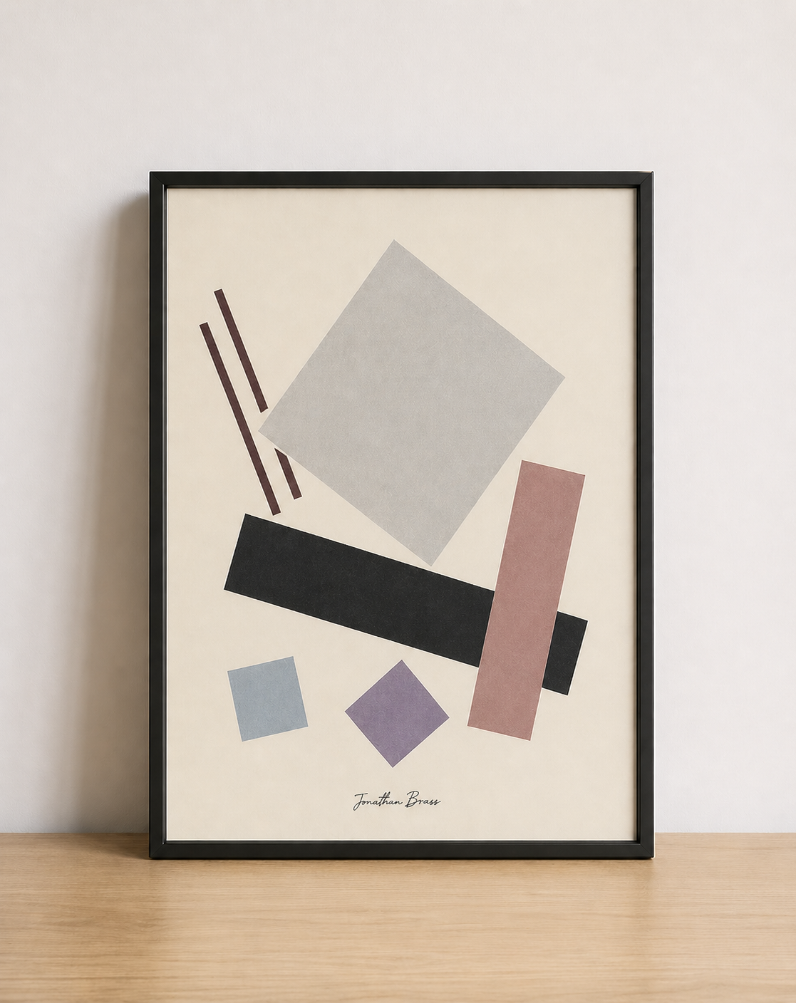 Minimalist geometric art on wood tabletop
